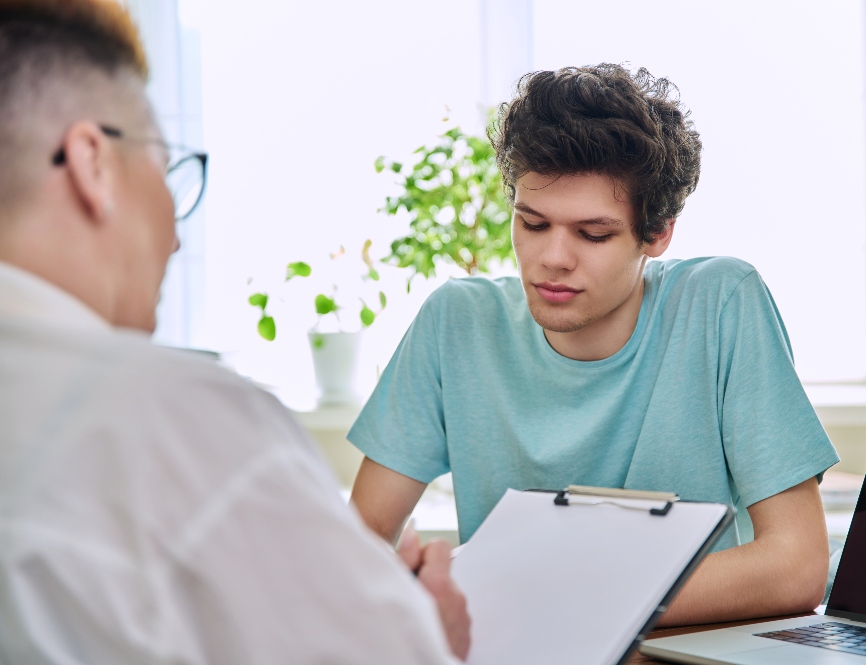 young man meeting with doctor about a medical detox